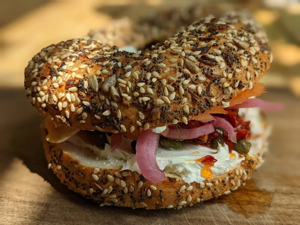 Lox Bagel with Cream Cheese Capers and Pickled Onion